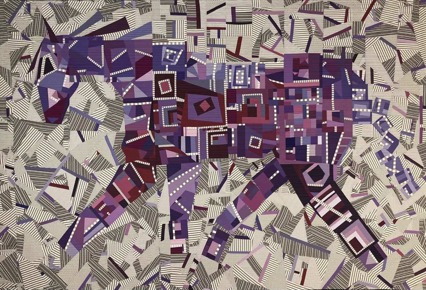 Purple and grey art quilt with a fragmented central form suggesting a horse